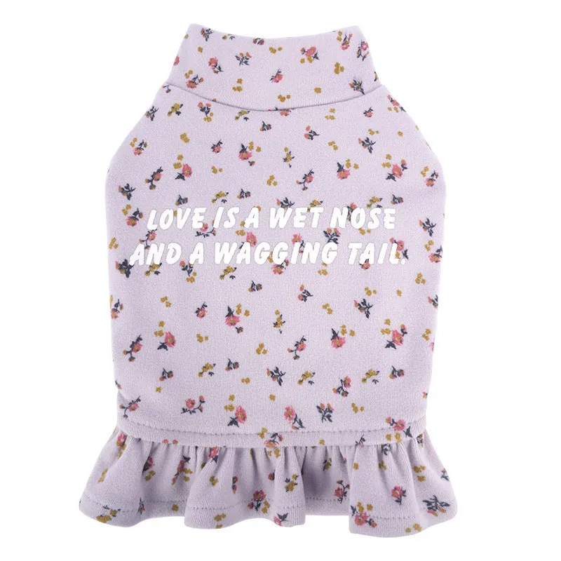 Light purple floral undershirt for a small Bichon Frise dog worn as a skirt.