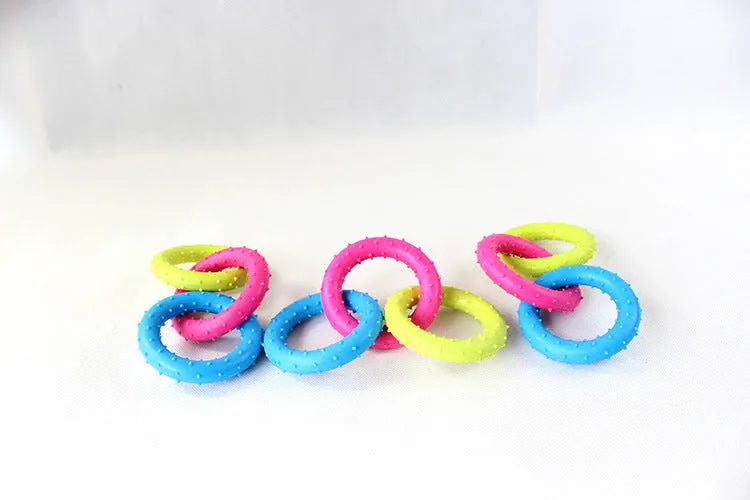 Three-chain TPR rubber dog molar toy for aggressive chewers shown in random colour