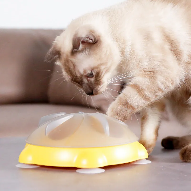 Bright yellow interactive cat toy and snack bowl for pet entertainment and feeding.
