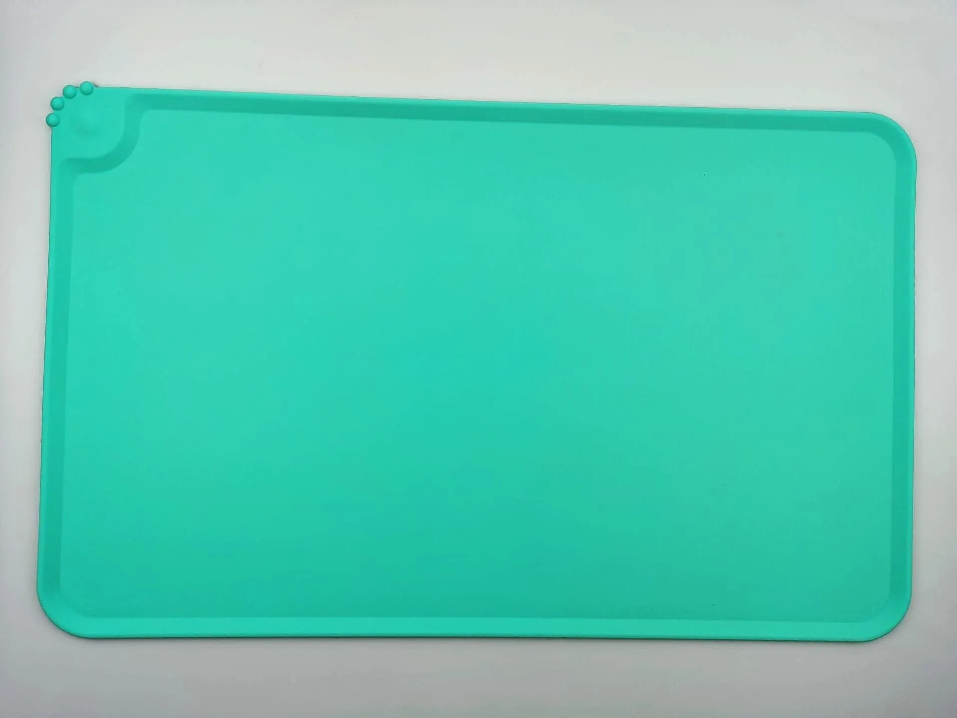 Silicone pet placemat under dog bowl in choice of five colours with anti-slip base