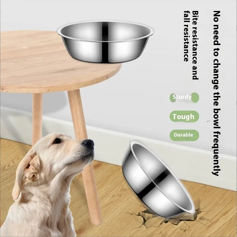 Stainless steel pet food bowl with non-slip base on a kitchen floor