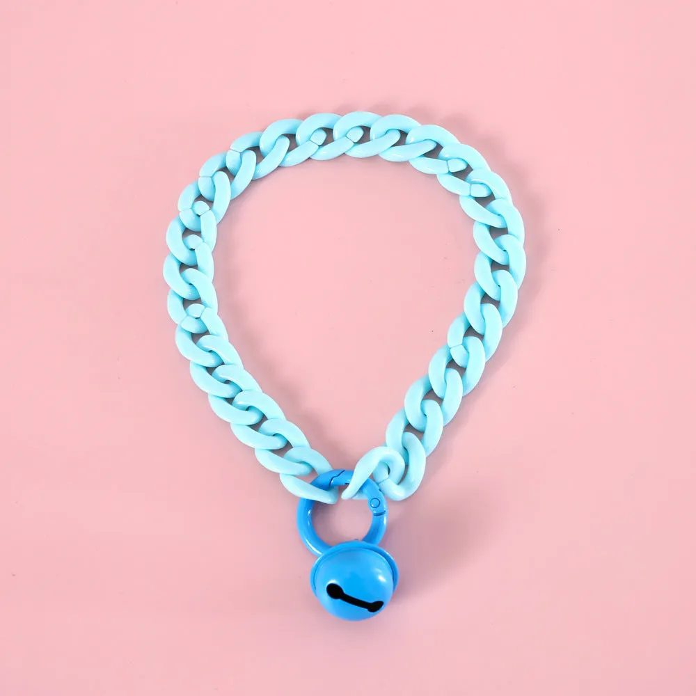 A macaron candy coloured plastic pet collar with chain detailing, shown in blue, pink, and mixed colour options.