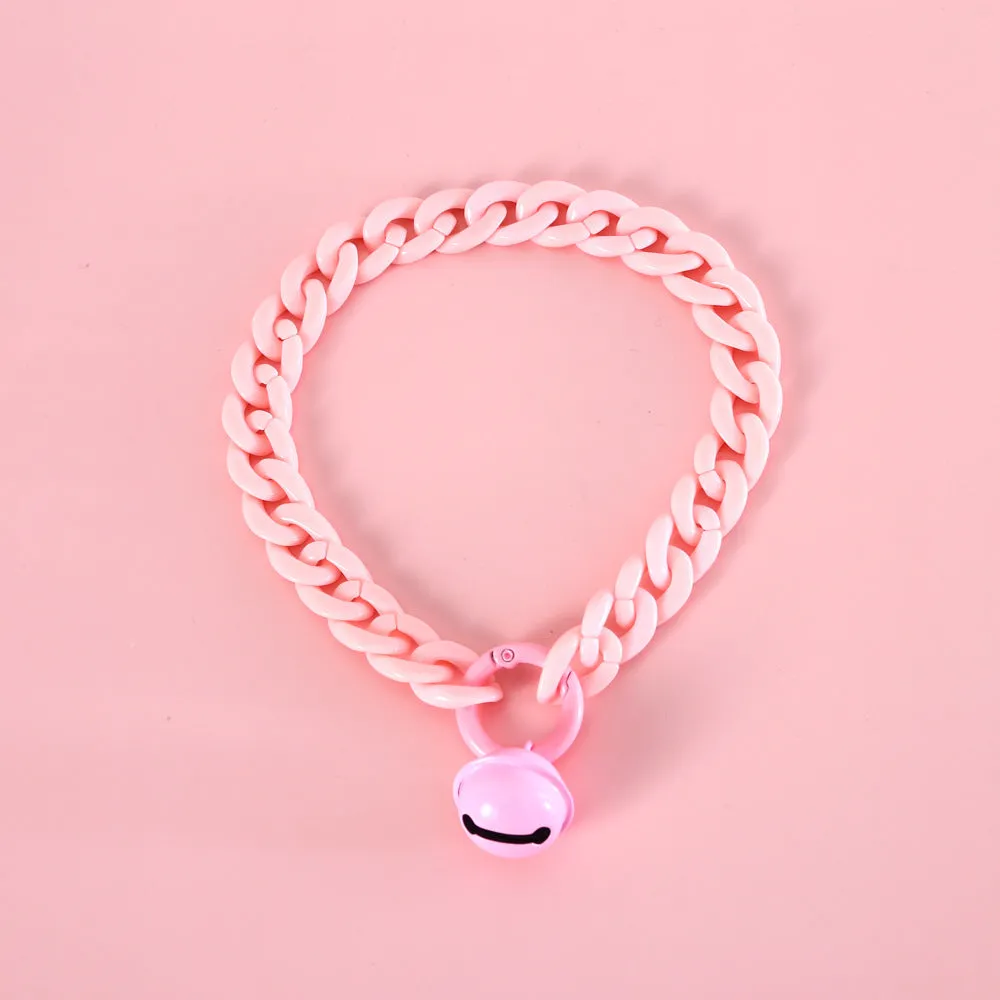 A macaron candy coloured plastic pet collar with chain detailing, shown in blue, pink, and mixed colour options.
