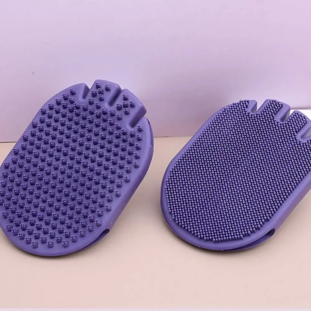 Purple pet shampoo brush with soft bristles and ergonomic handle for dog and cat grooming