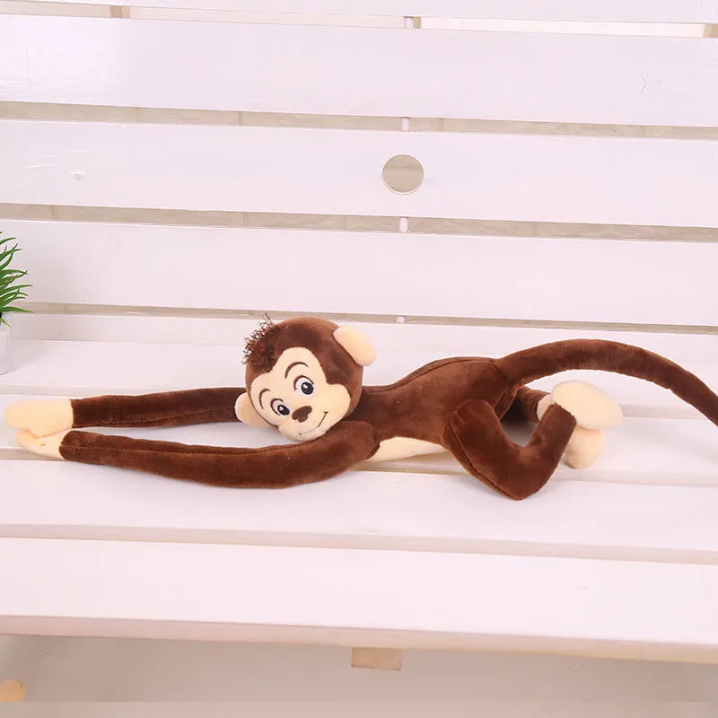 Plush hanging monkey toy with long arms in pink, red, or brown colours for curtain decoration