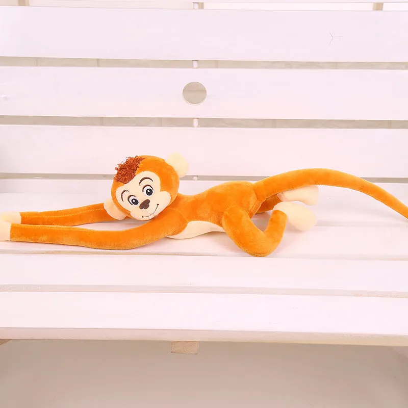 Plush hanging monkey toy with long arms in pink, red, or brown colours for curtain decoration