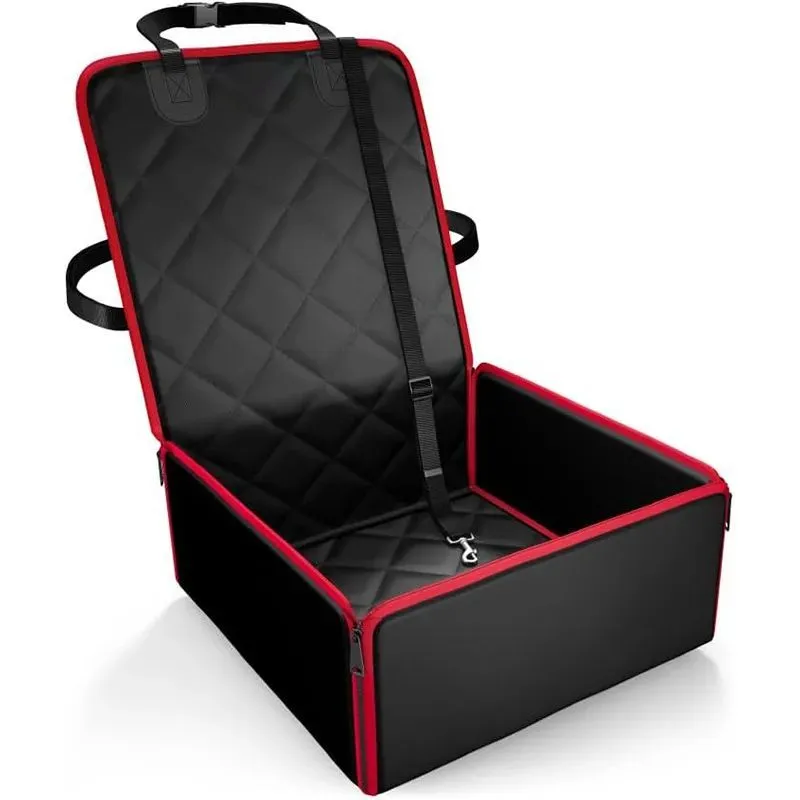 A black non-slip car pet pad for dogs placed on a grey car front seat.