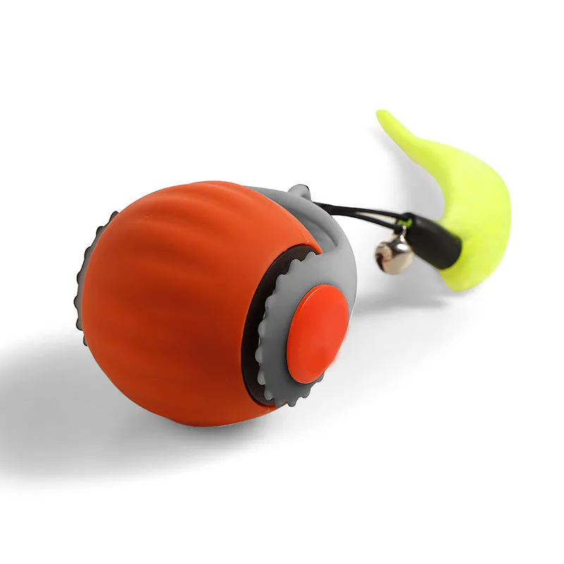 Orange and blue silicone gravity-powered cat toy with rolling ball and gun grip attachment options
