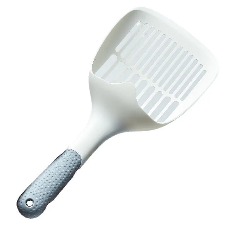White plastic cat litter scoop with storage base for containing tool between uses