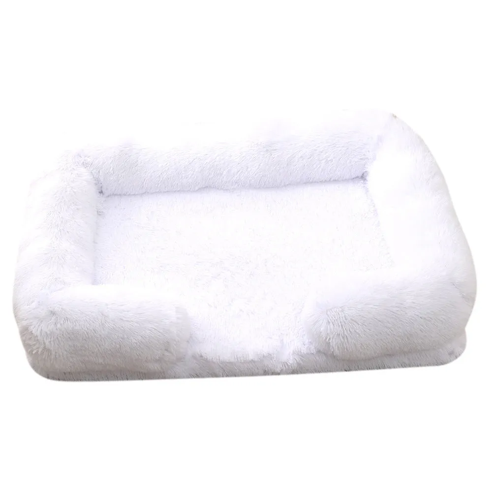 Plush round dog bed in beige brown with raised edges and a removable inner sleeve.
