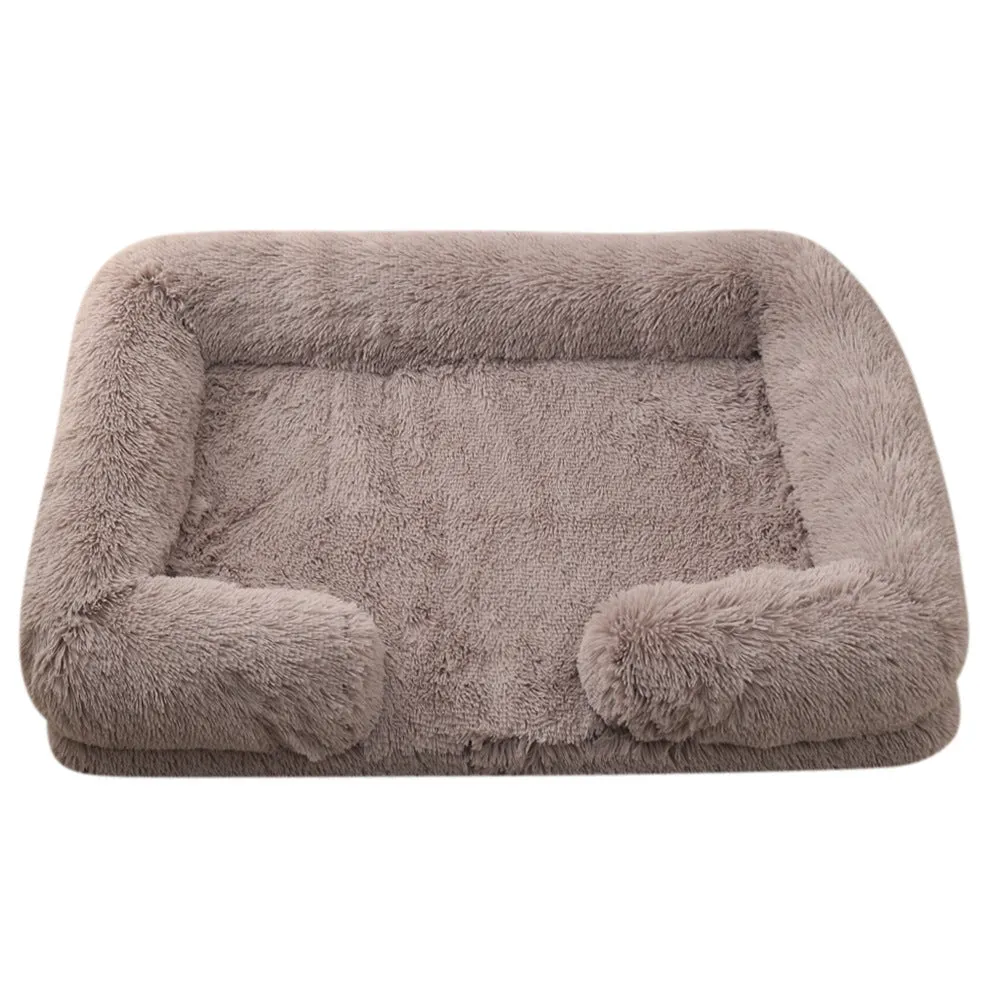 Plush round dog bed in beige brown with raised edges and a removable inner sleeve.