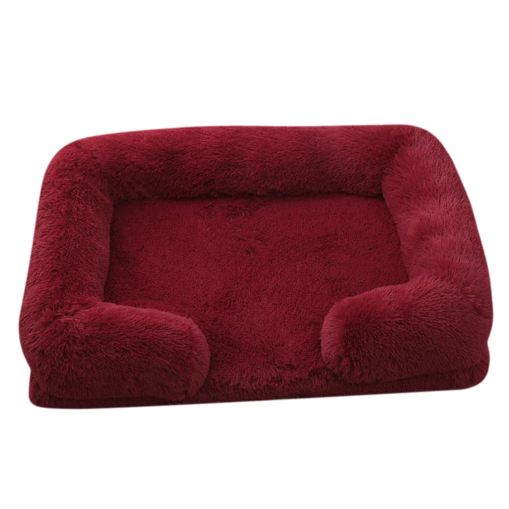 Plush round dog bed in beige brown with raised edges and a removable inner sleeve.