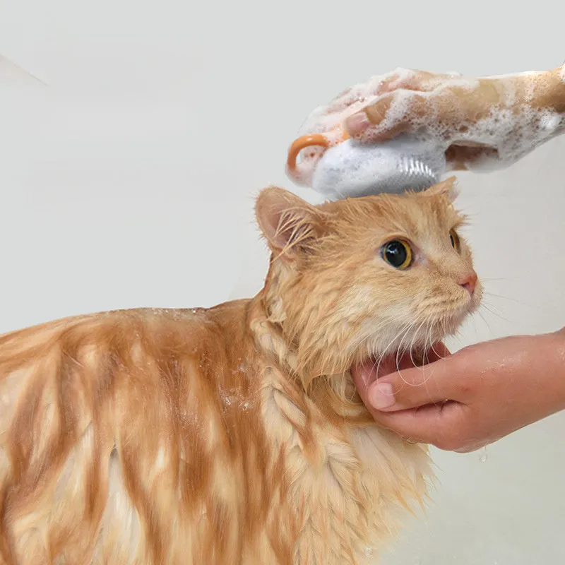 Orange TPR dog shampoo brush with silicone comb teeth and pumpkin-shaped ergonomic handle