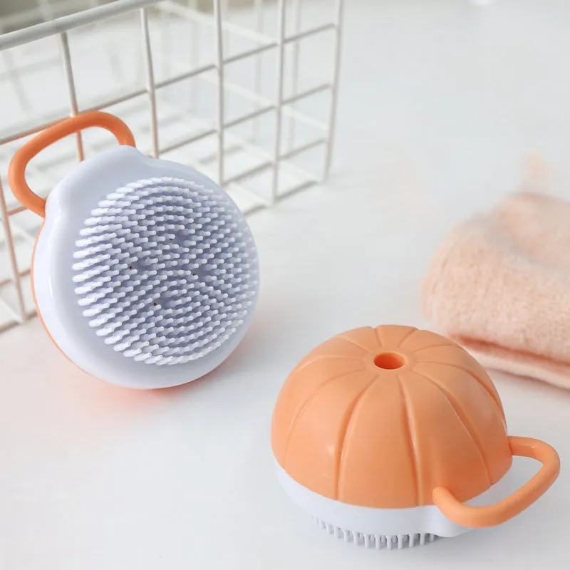 Orange TPR dog shampoo brush with silicone comb teeth and pumpkin-shaped ergonomic handle