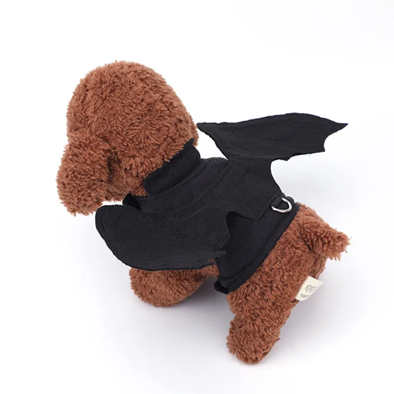 Black bat wing Halloween costume accessory for dogs on grass