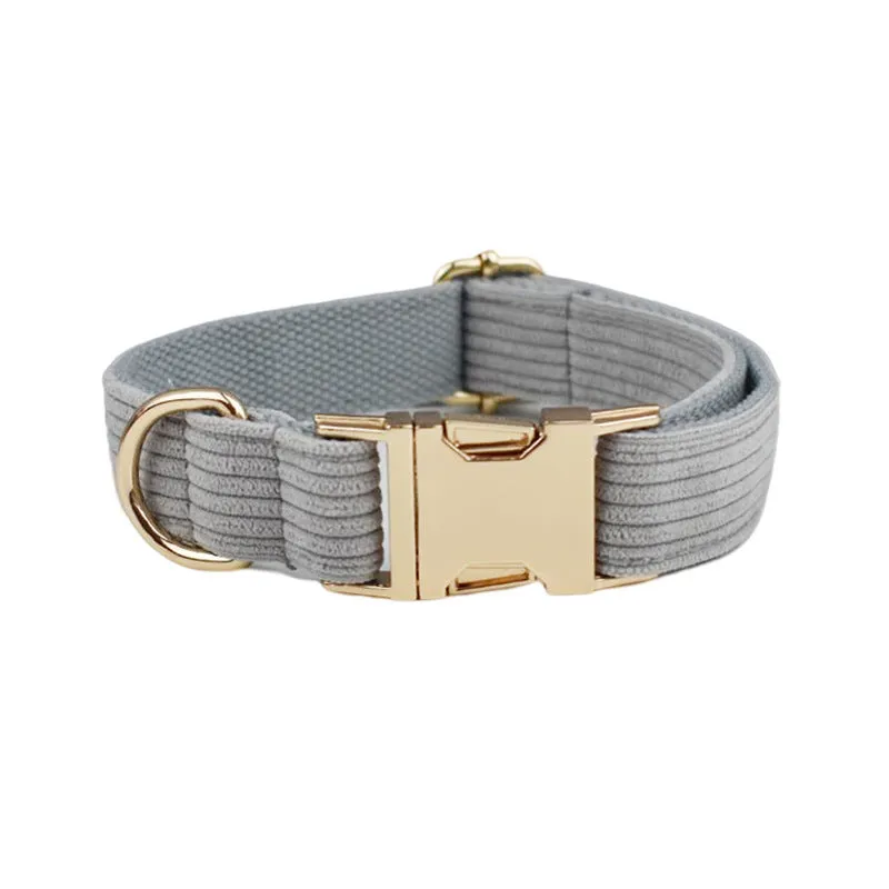 Textured corduroy dog collar in light green colour with metal D-ring and plastic buckle clasp.