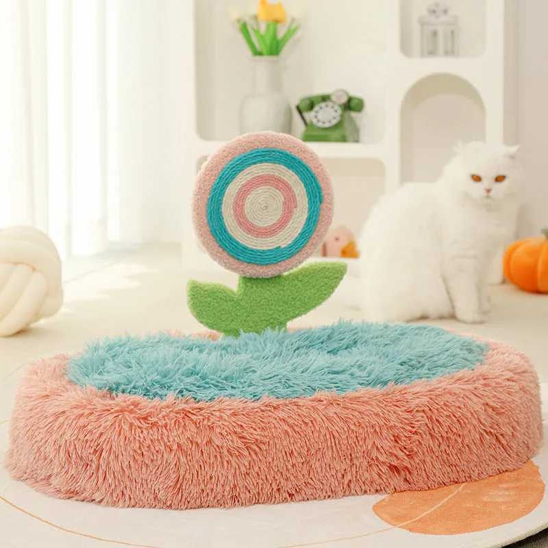 Pink elliptical plush cat nest bed with a soft padded base, shown disassembled.