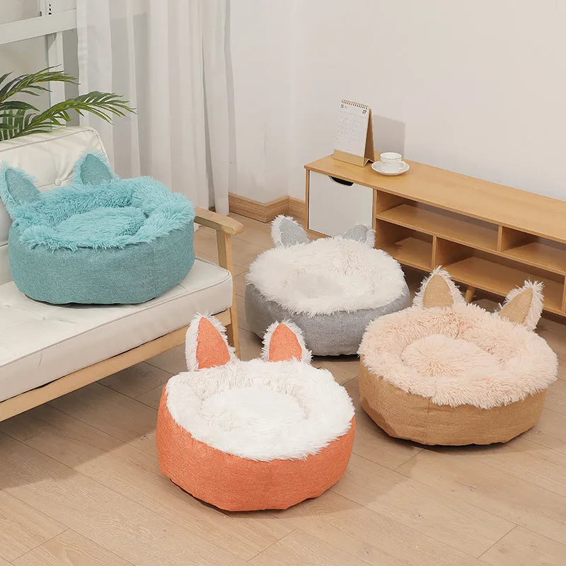 Soft faux fur plush cat bed in grey with fluffy interior – available in multiple sizes and colours for indoor use