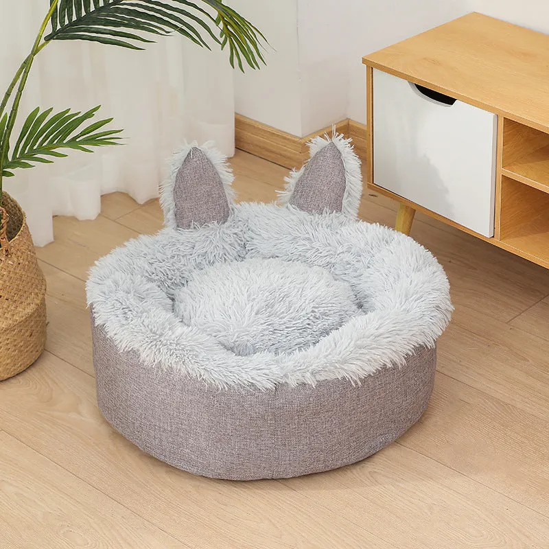 Soft faux fur plush cat bed in grey with fluffy interior – available in multiple sizes and colours for indoor use