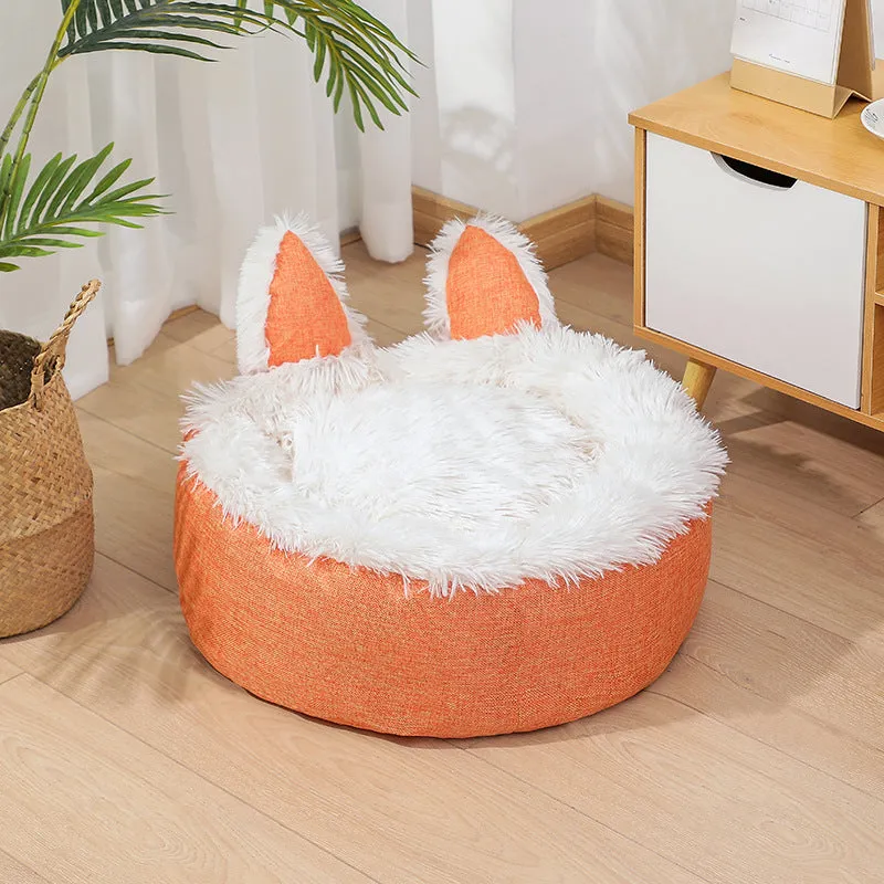Soft faux fur plush cat bed in grey with fluffy interior – available in multiple sizes and colours for indoor use