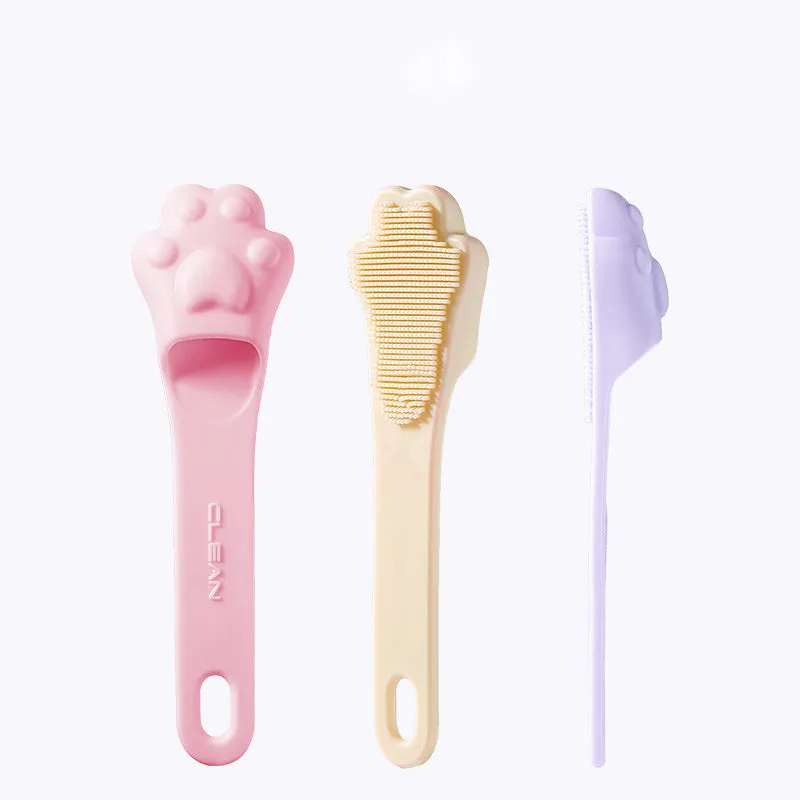 Silicone finger cover toothbrush for dogs and cats in pink, purple, yellow, and white.