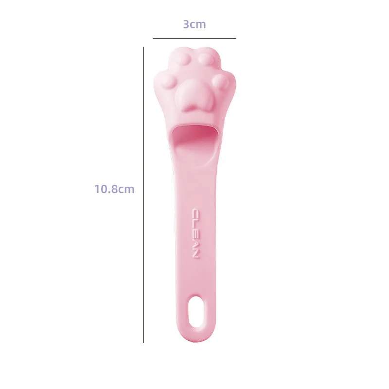 Silicone finger cover toothbrush for dogs and cats in pink, purple, yellow, and white.