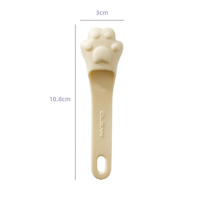 Silicone finger cover toothbrush for dogs and cats in pink, purple, yellow, and white.