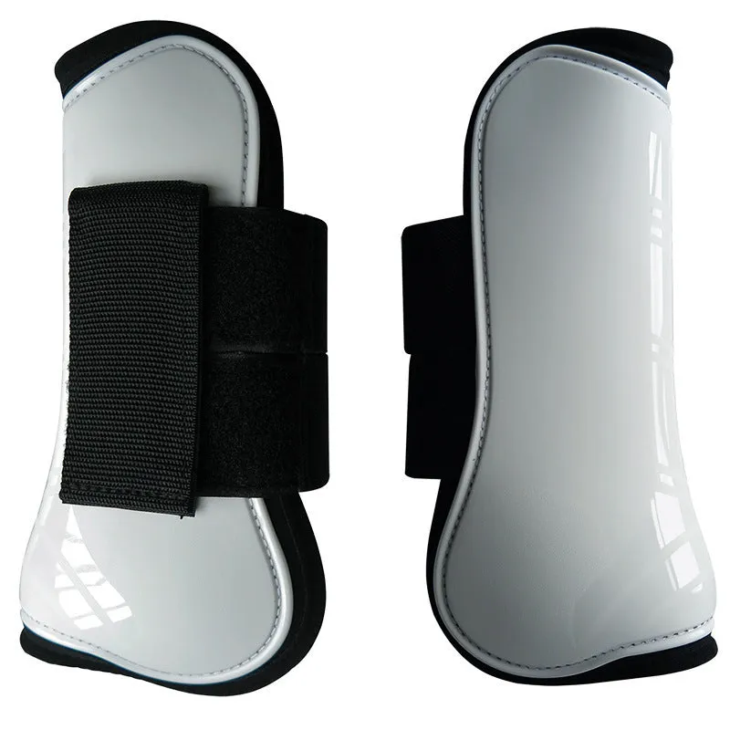 Horse leg guards in PU diving material, close-up on a front leg guard showing red colour and padded construction