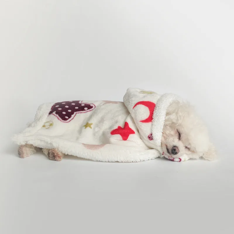 White coral fleece pet pajamas with moon and stars pattern on a light background, size M