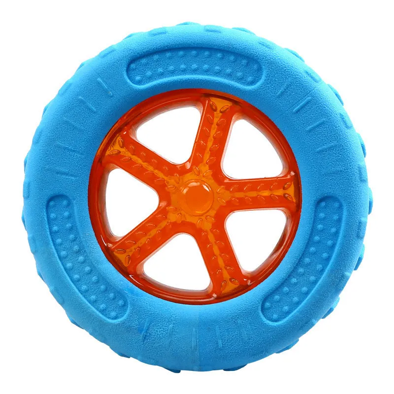Set of three TPR dog toys: a blue ball, a red barbell, and an orange tyre with bumpy textures.