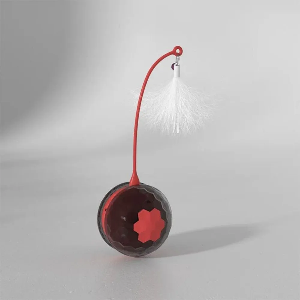 Red automatic cat toy with feather attachment showing tumbler design and USB charging port