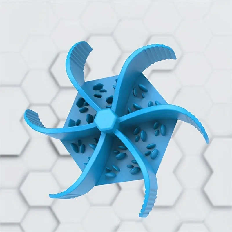 Silicone pet slow food device with sucker cup in green colour on a smooth floor