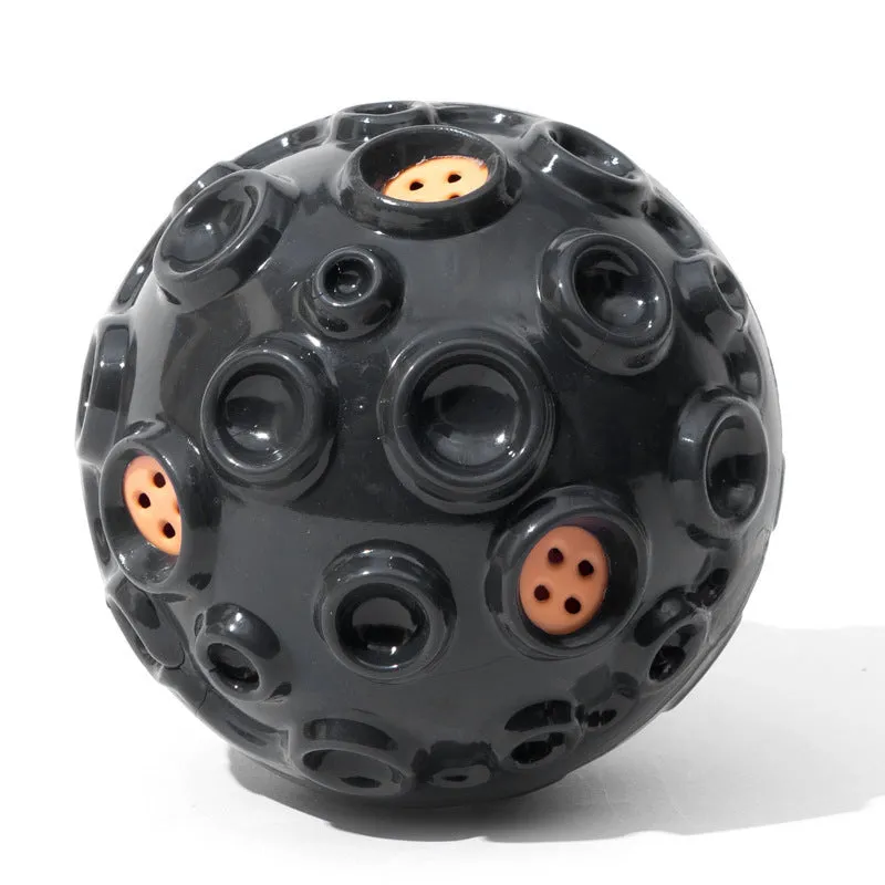 Colourful durable dog chew ball with textured surface and internal squeaker for aggressive chewers