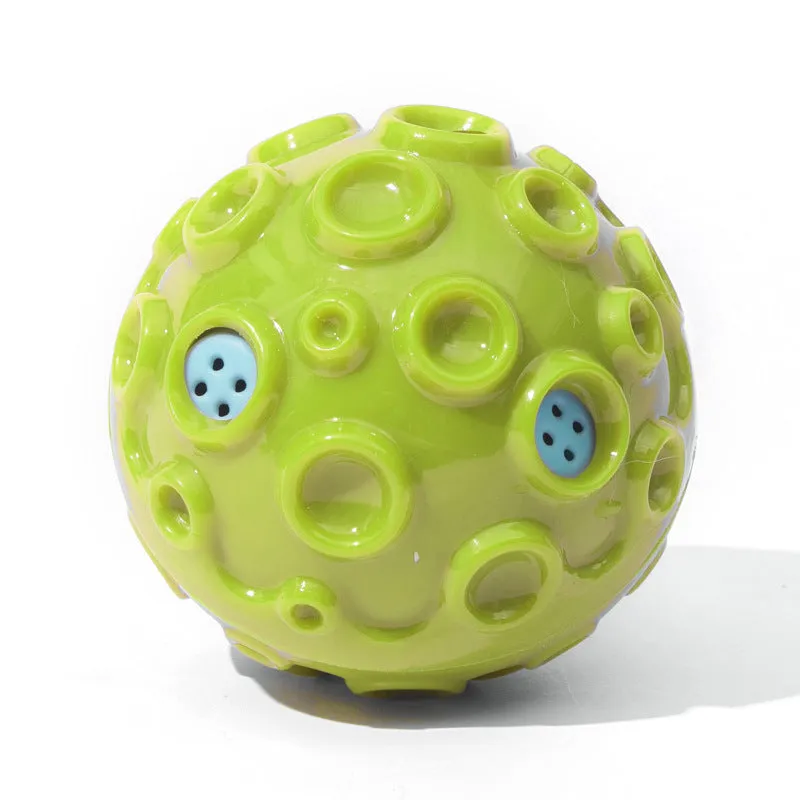 Colourful durable dog chew ball with textured surface and internal squeaker for aggressive chewers