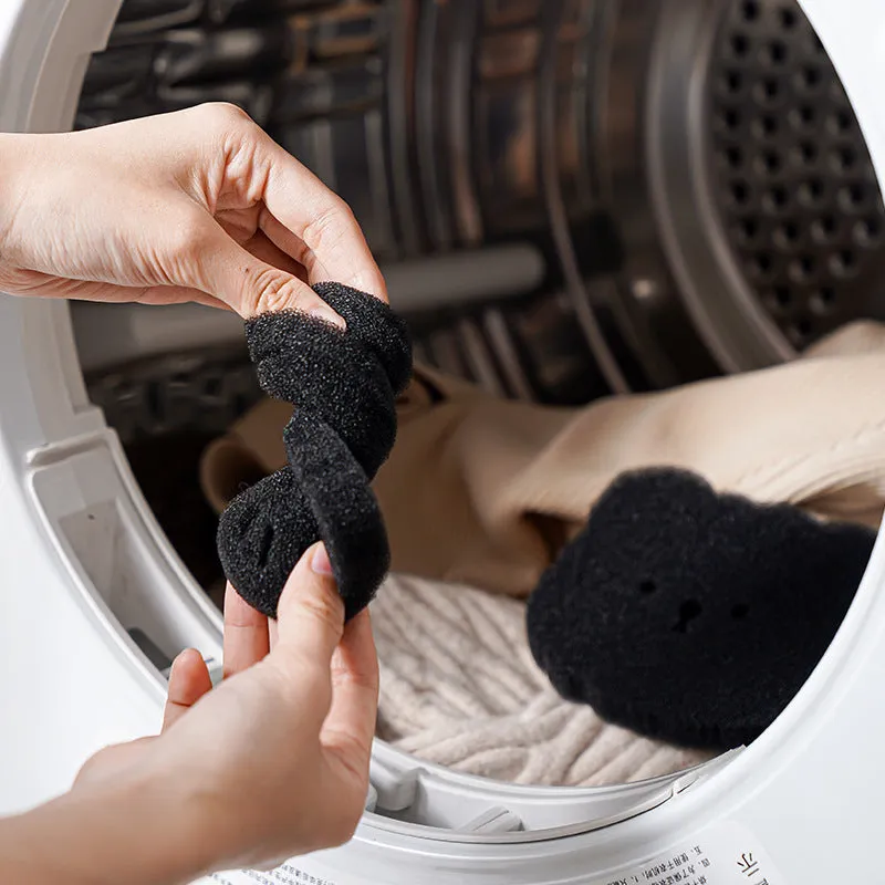 Black bear shaped sponge cleaning ball for pet hair removal from fabrics
