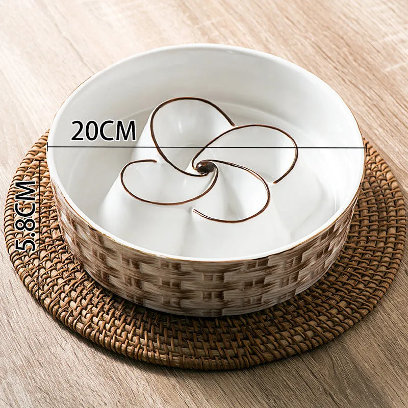 Blue ceramic slow feeder dog bowl with maze pattern and non-slip rubber base for large dogs.