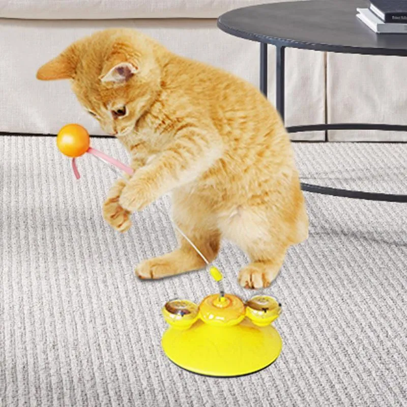 Cat interactive toy with suction cup base and colourful LED lights on spring mechanism
