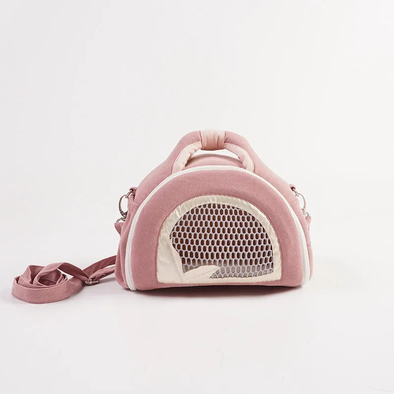 Hamster breathable crossbody handbag with outer strap in mesh fabric, available in multiple colours.