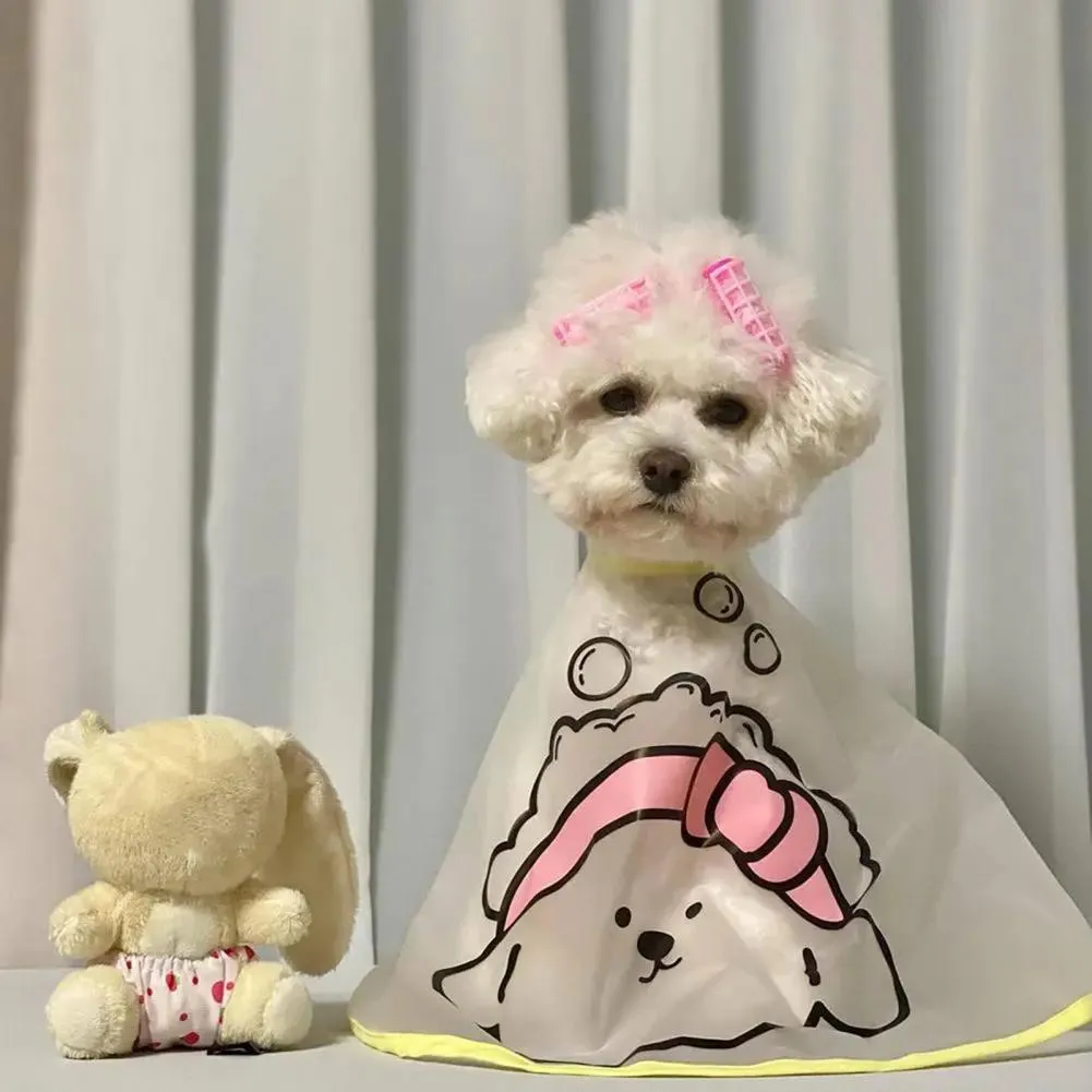 Adjustable pet grooming cape with cartoon print for dogs, polyester fabric, pink and yellow options
