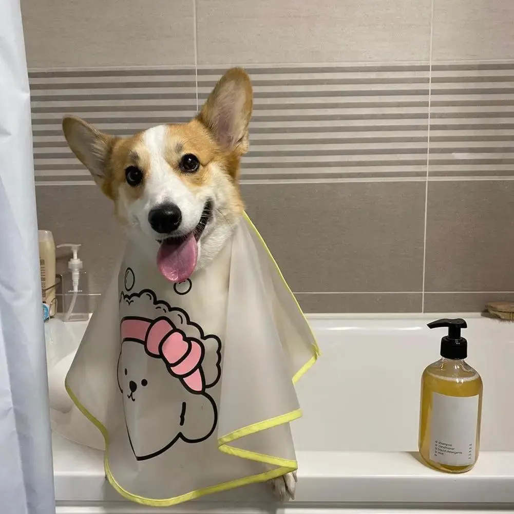 Adjustable pet grooming cape with cartoon print for dogs, polyester fabric, pink and yellow options