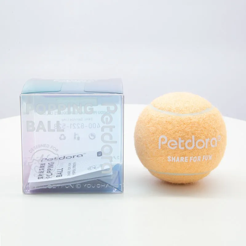 Dog toy high elastic macaron pet tennis ball in ice crystal blue on white background
