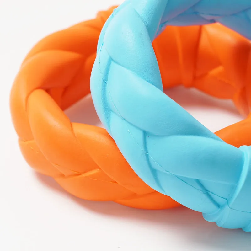 Blue rubber woven ring dog toy for teeth cleaning and interactive training on a plain background
