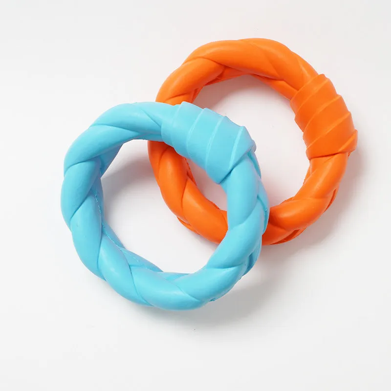 Blue rubber woven ring dog toy for teeth cleaning and interactive training on a plain background