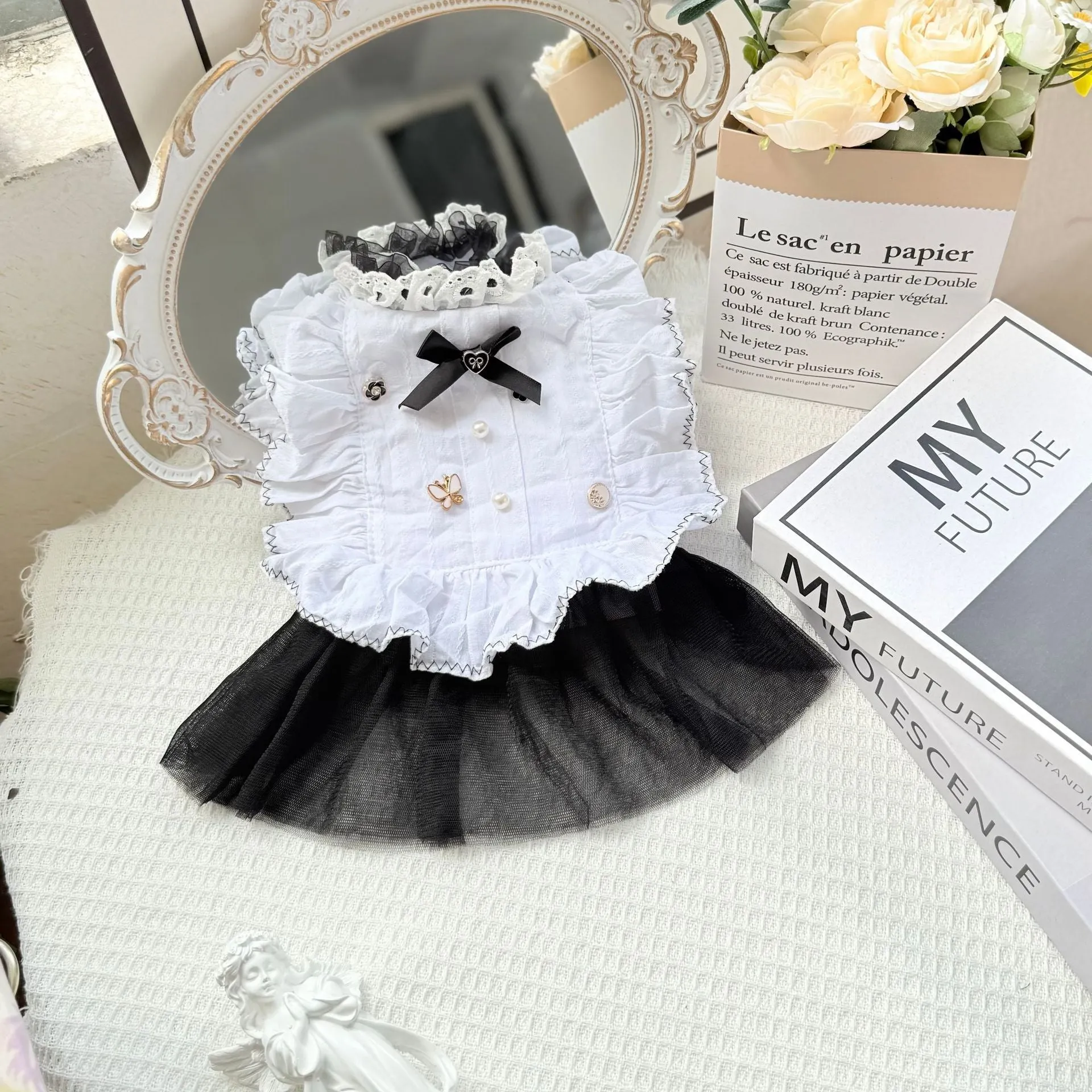 White yarn skirt princess-style dog dress for small dogs, shown on a mannequin.