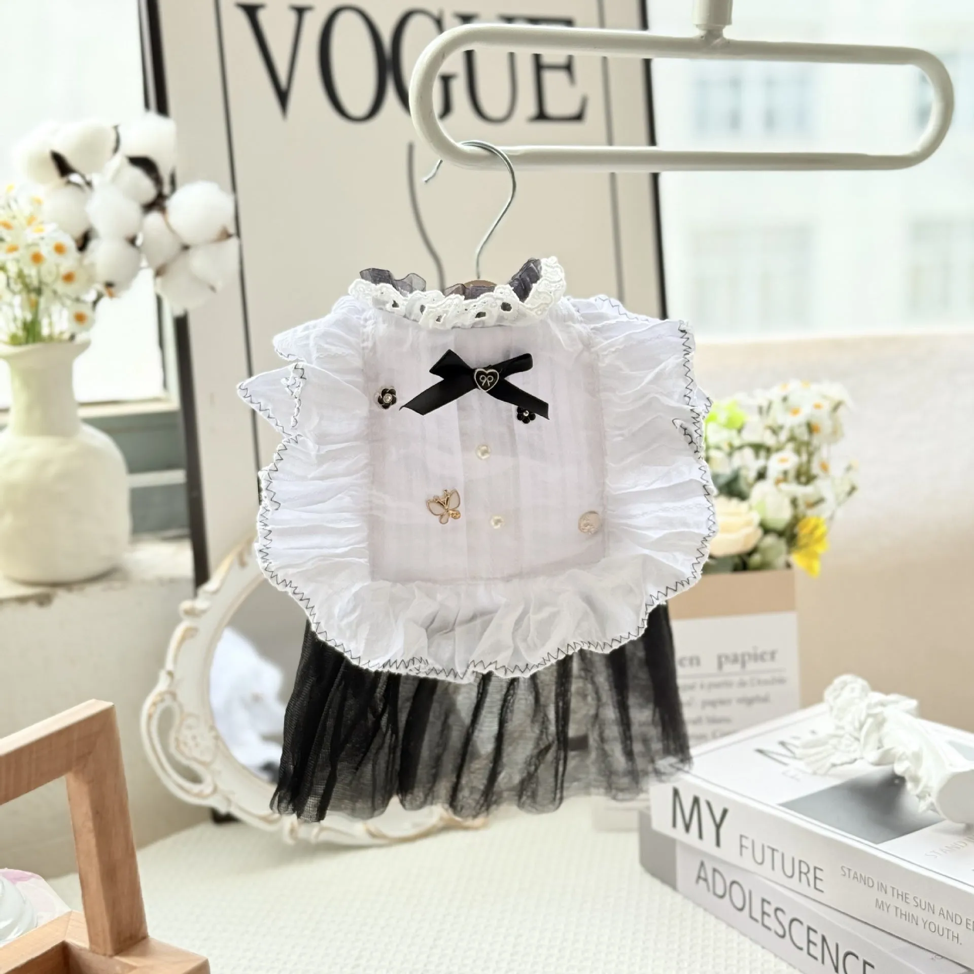 White yarn skirt princess-style dog dress for small dogs, shown on a mannequin.