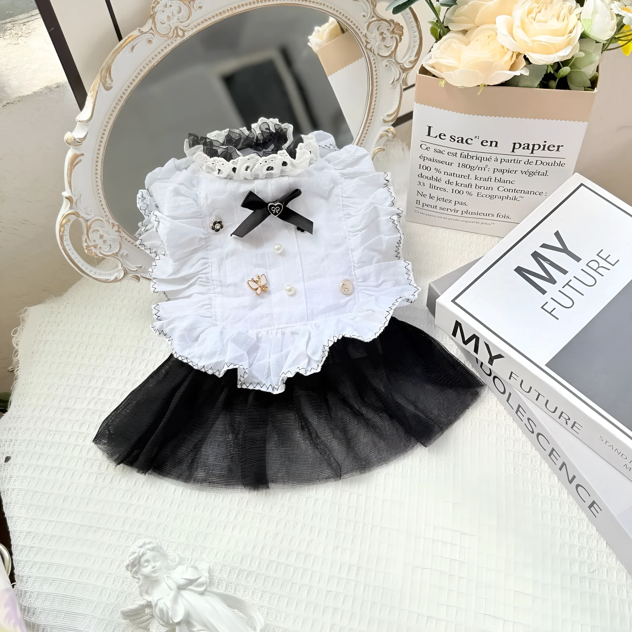 White yarn skirt princess-style dog dress for small dogs, shown on a mannequin.