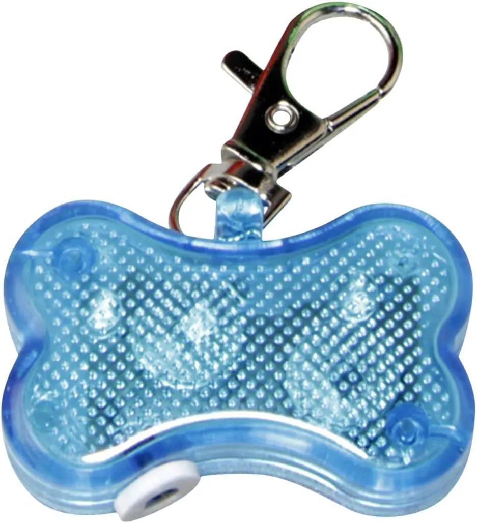 Blue LED luminous bone-shaped pendant for pet collars showing scale next to LR44 batteries.
