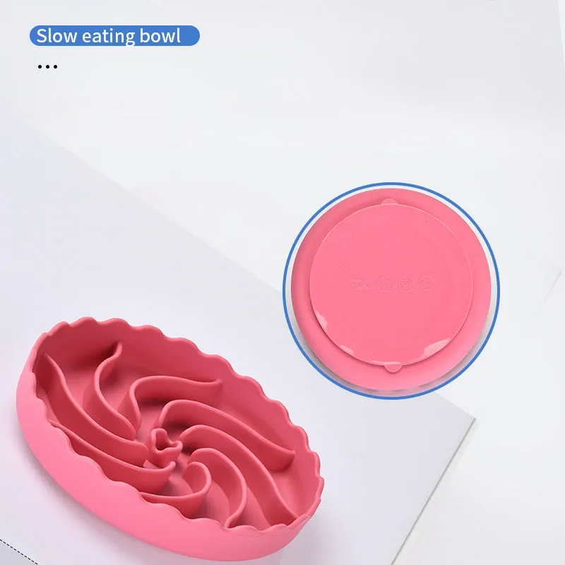 Food-grade silicone slow feeder dog bowl in blue with suction cup base and raised maze ridges