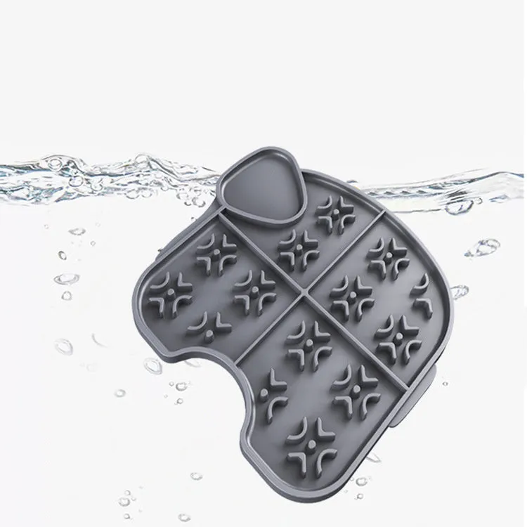 Gray silicone pet slow food pad with suction cups under a pet bowl