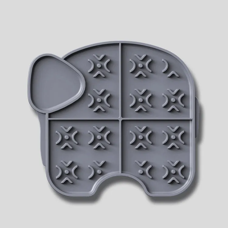 Gray silicone pet slow food pad with suction cups under a pet bowl